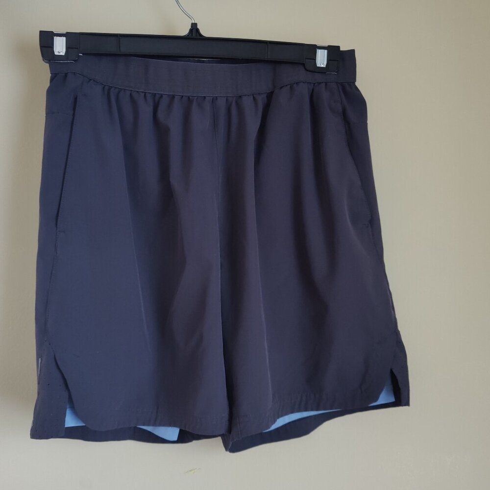 Skora Women's lined shorts with light blue lining - size medium